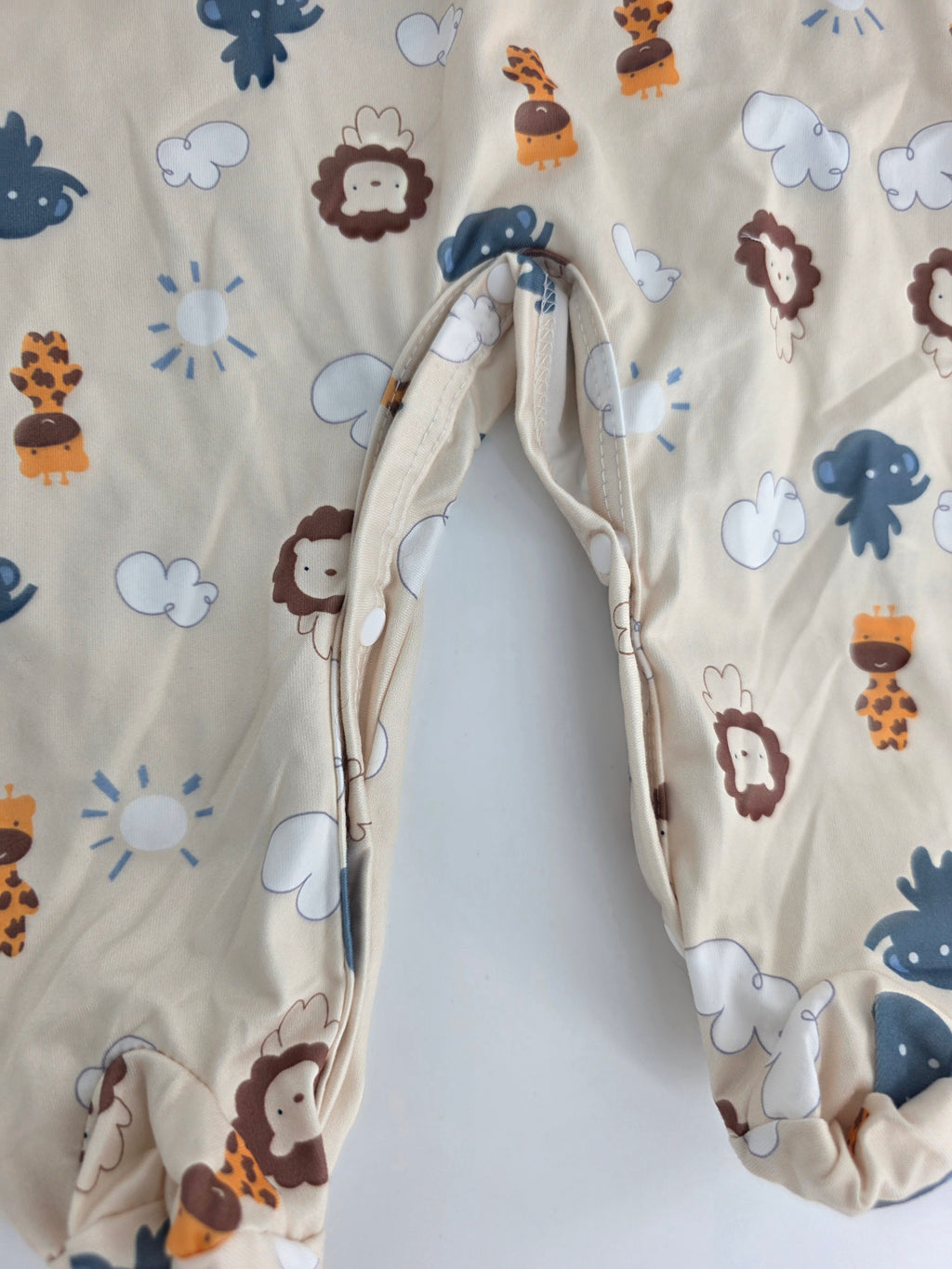 Safari Animal Footed Romper – 6–9M