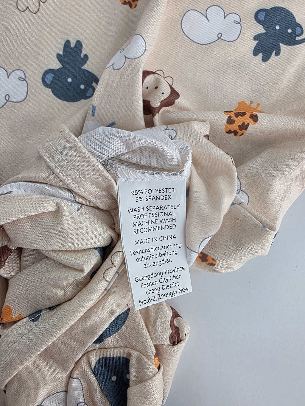 Safari Animal Footed Romper – 6–9M