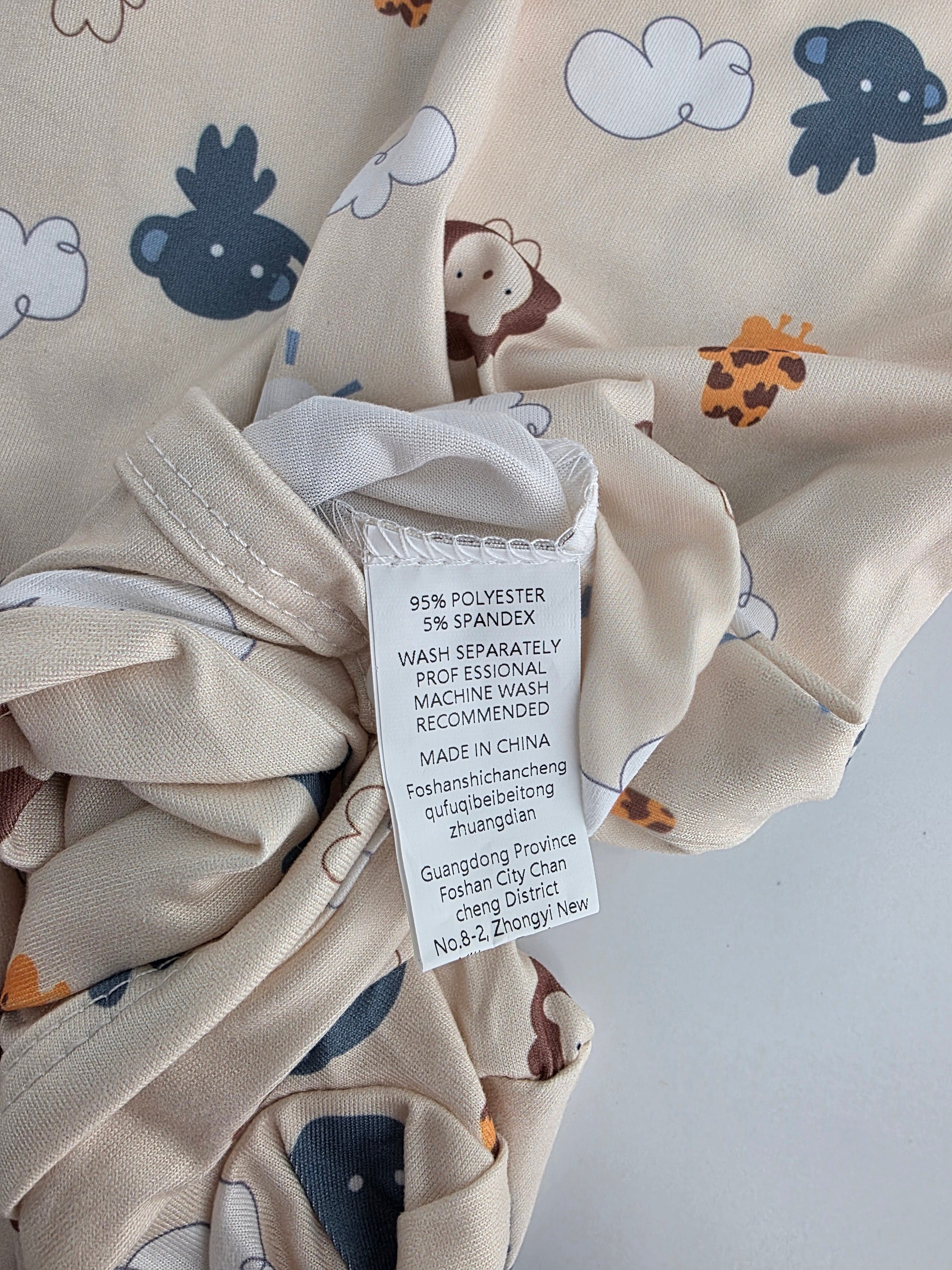 Safari Animal Footed Romper – 6–9M